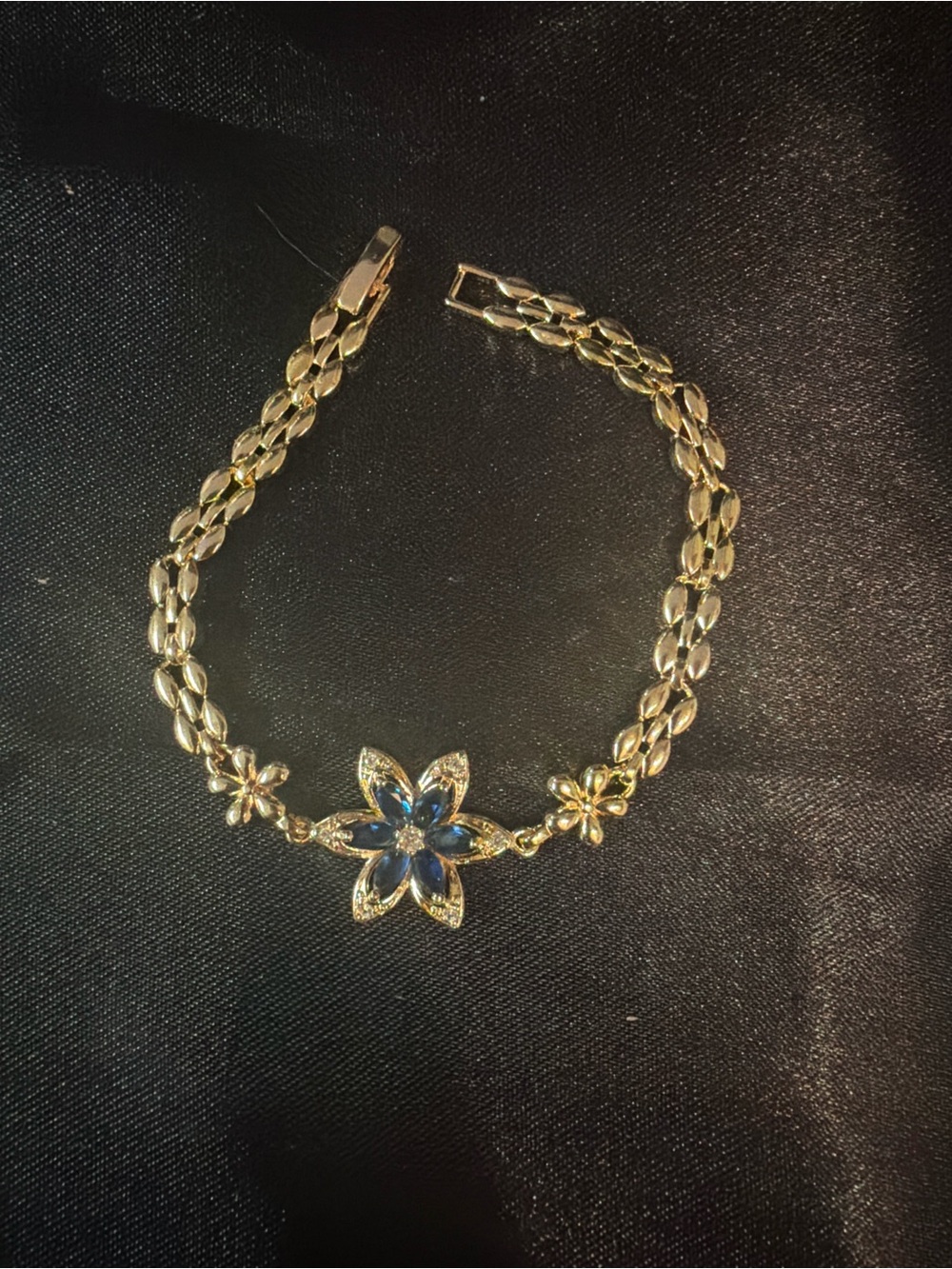 Gold-Tone Floral Bracelet with Blue Crystal Petals